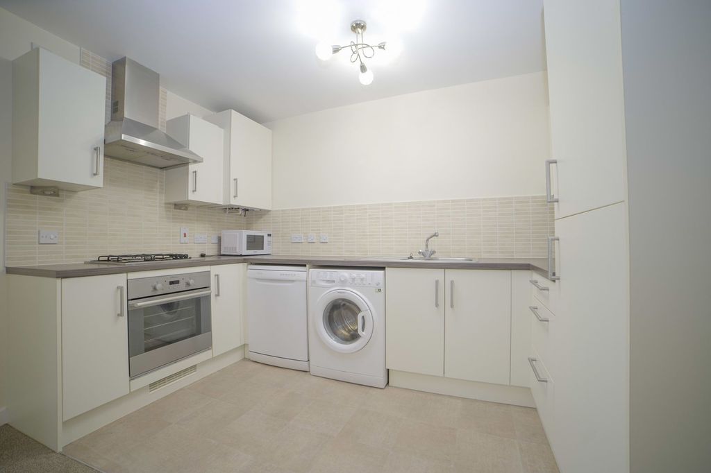 Property photo 3 of 12 Kitchen Area
