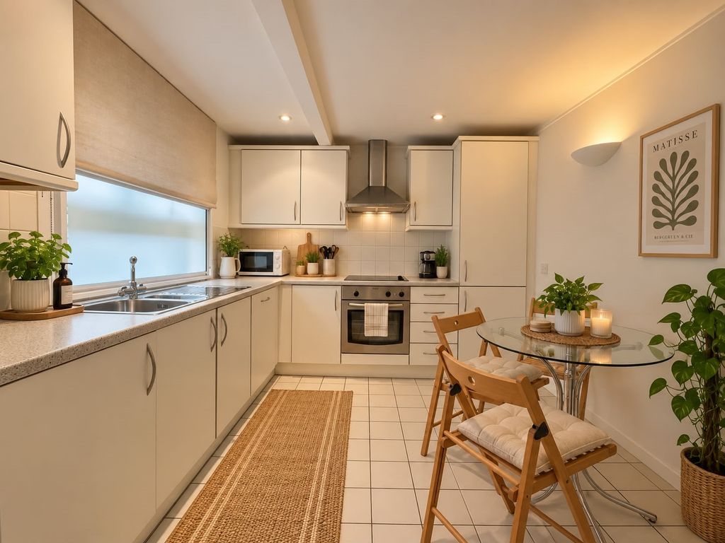 Property photo 3 of 4 Kitchen