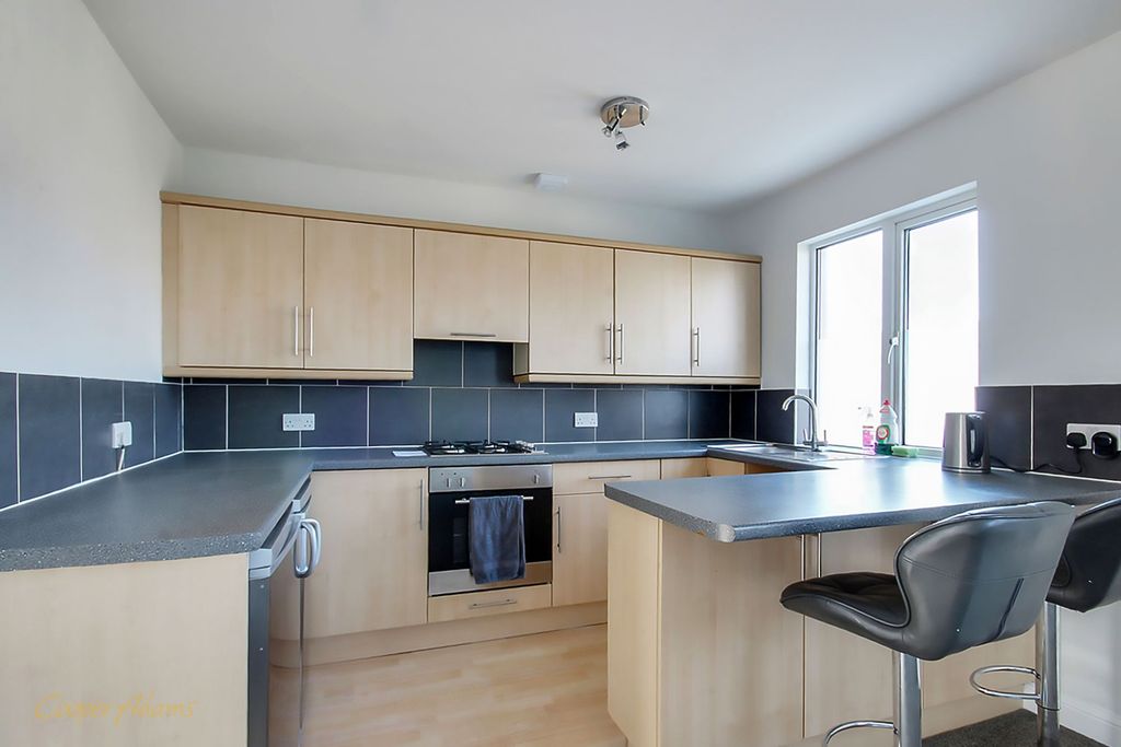 Property photo 2 of 7 Kitchen Area