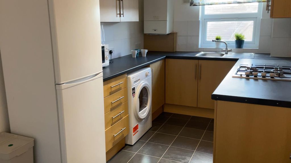 Property photo 3 of 12 Kitchen