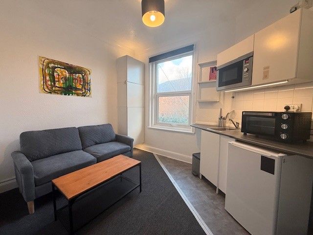 Property photo 3 of 8 Living Area