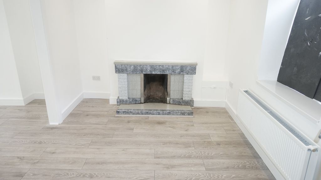 Property photo 2 of 10 Front Lounge Area