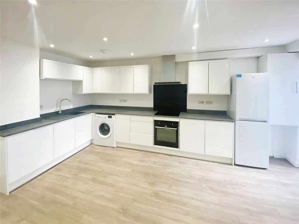 Property photo 3 of 9 Kitchen Area