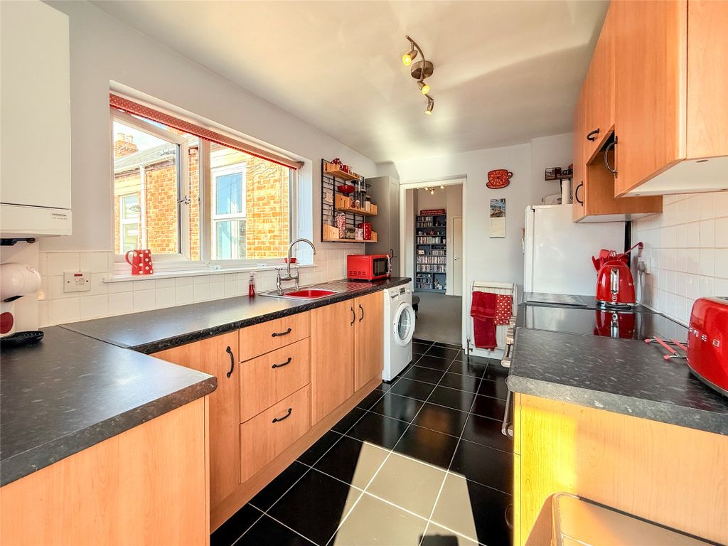Property photo 3 of 12 Kitchen