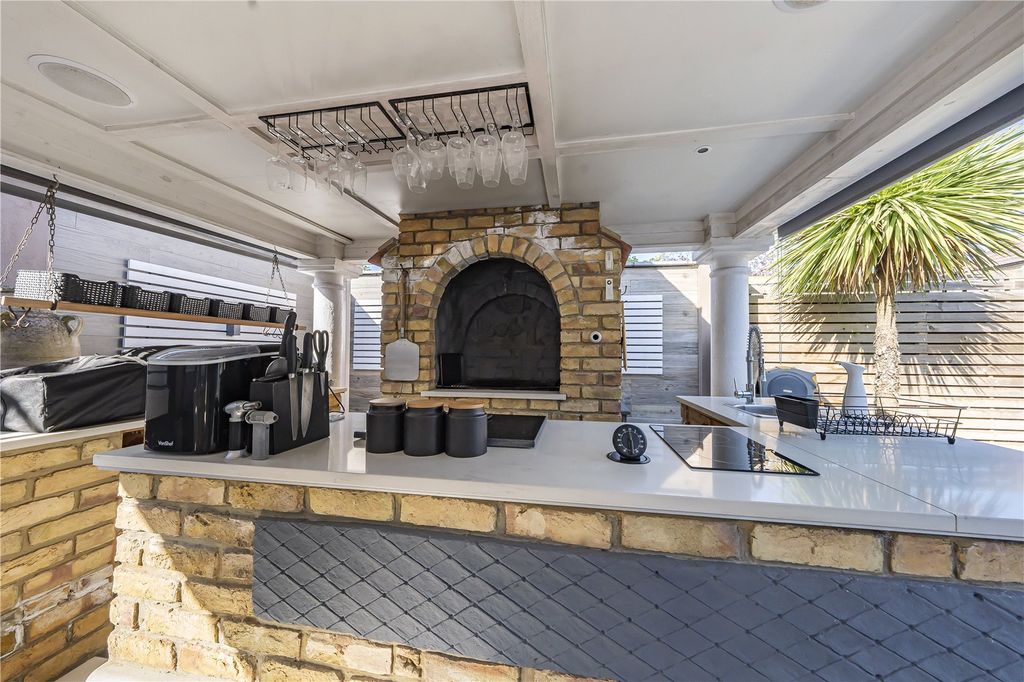 Property photo 2 of 24 BBQ Area