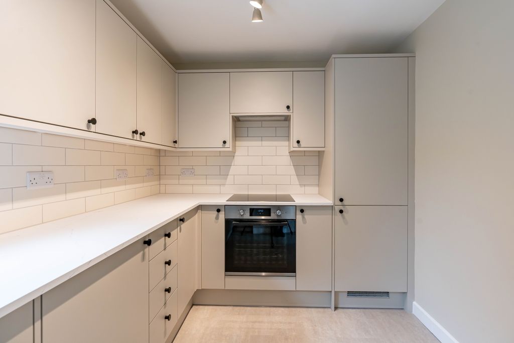 Property photo 2 of 12 Kitchen