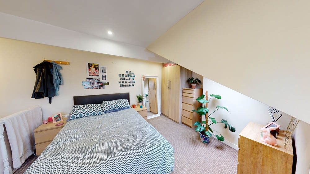 Property photo 1 of 7 A Bright And Well-Maintained Bedroom Featuring A c...