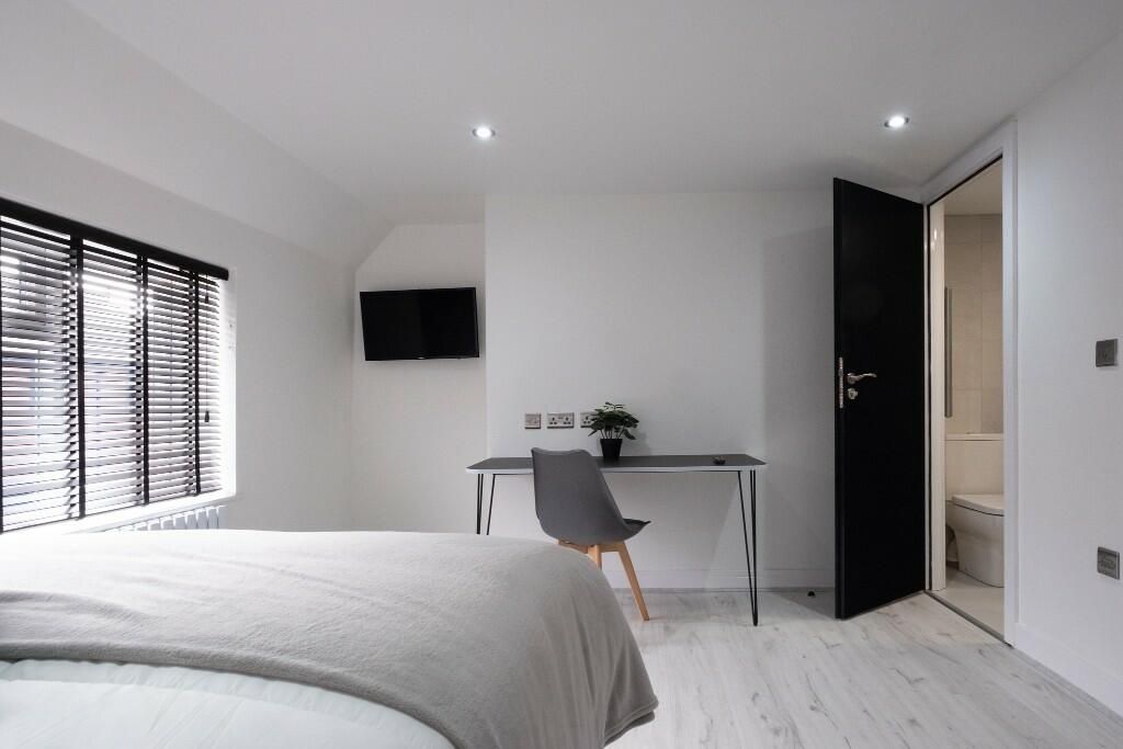 Property photo 3 of 15 A Bright, Spacious Master Bedroom With A Large Bed...