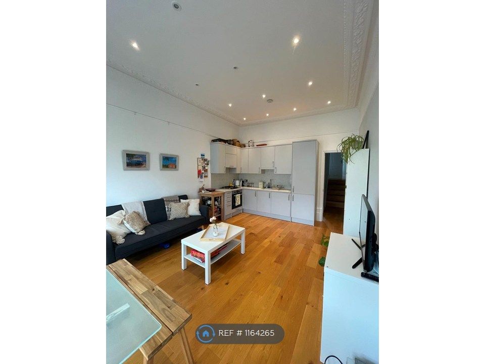 Property photo 3 of 8 Living Area