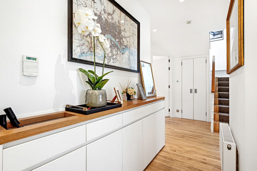 Property photo 3 of 20 Hallway With Storage And Cloak Room
