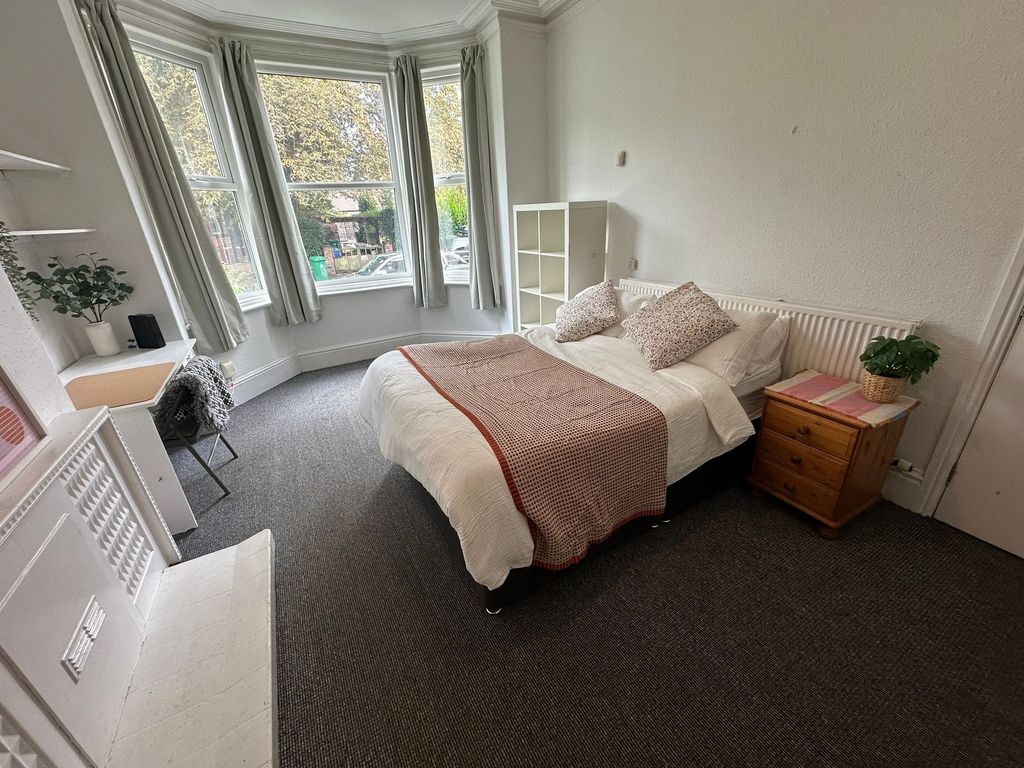 Property photo 3 of 42 Bright And Welcoming Living Room With Large Bay Wi...