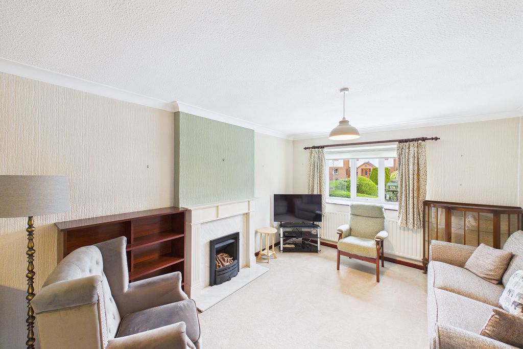 Property photo 3 of 12 Living Area