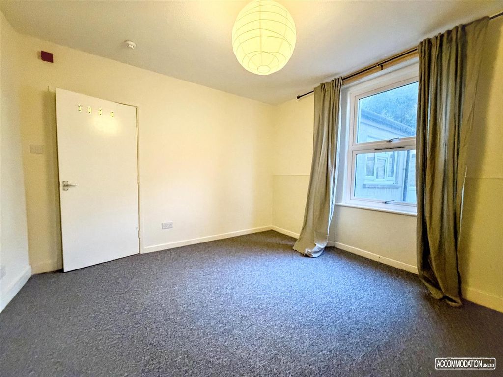 Property photo 2 of 8 Spacious Bedroom With Window And Clean Carpet...