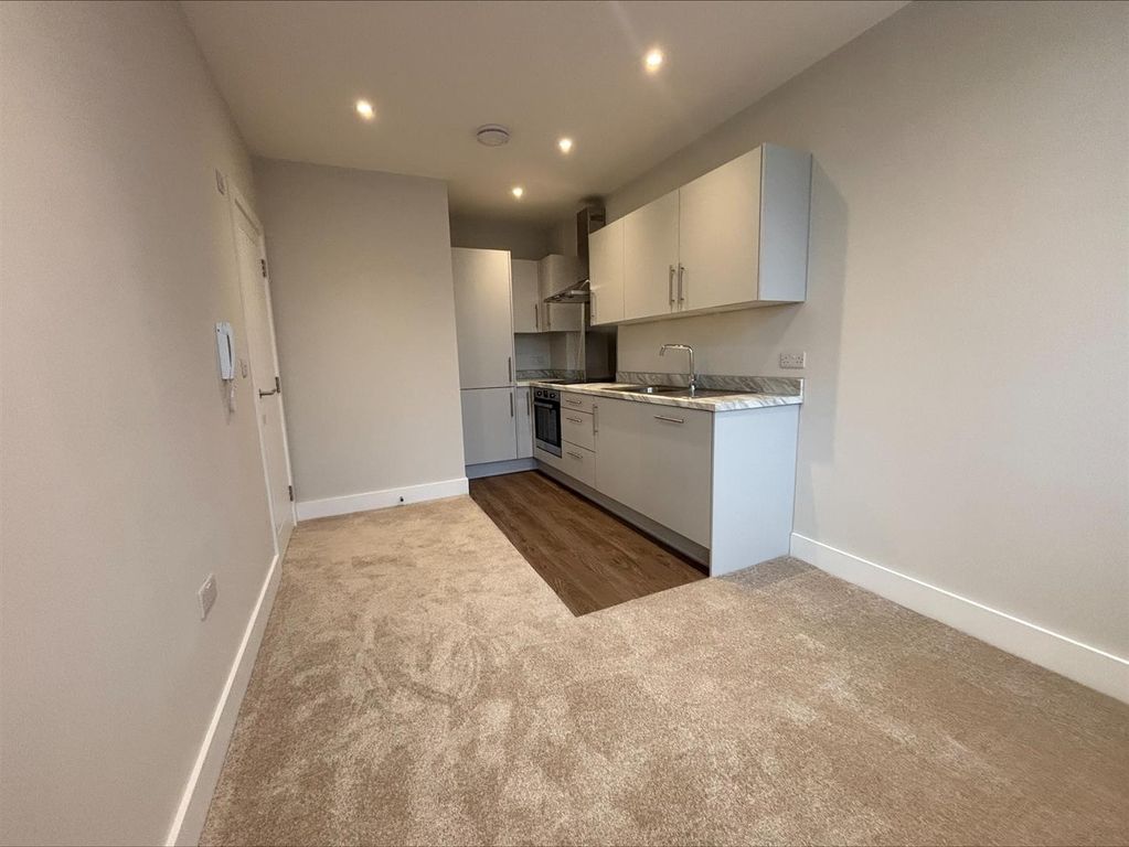 Property photo 1 of 8 Living Area