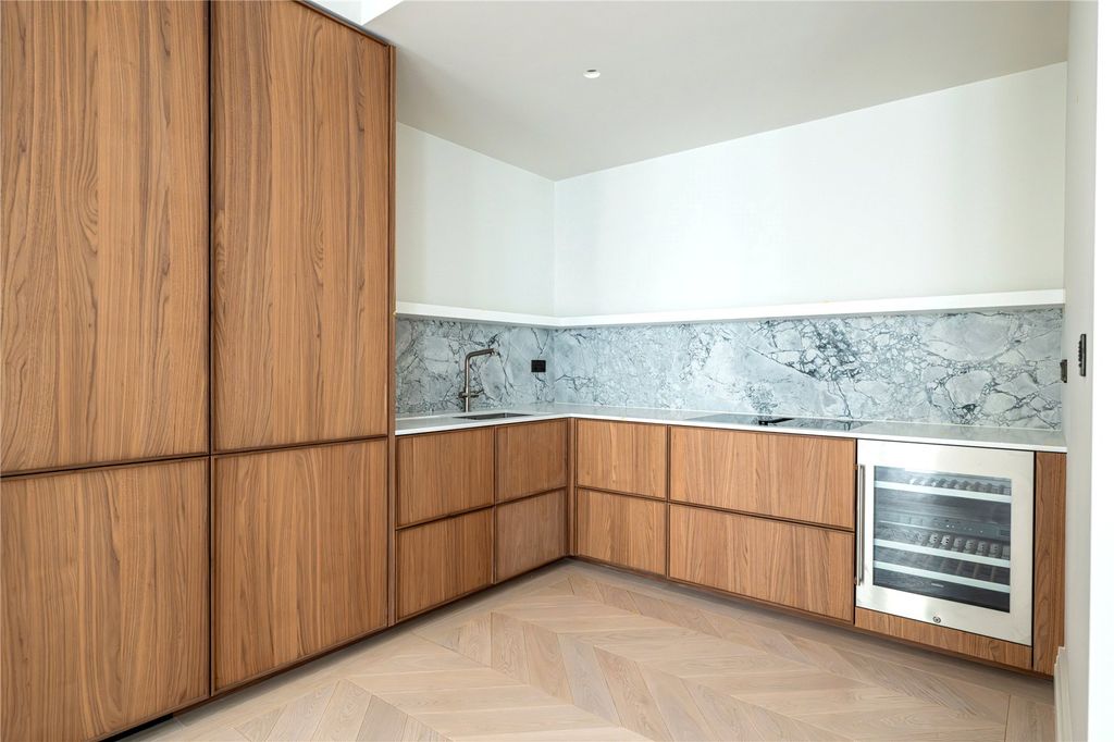 Property photo 3 of 11 Kitchen Area