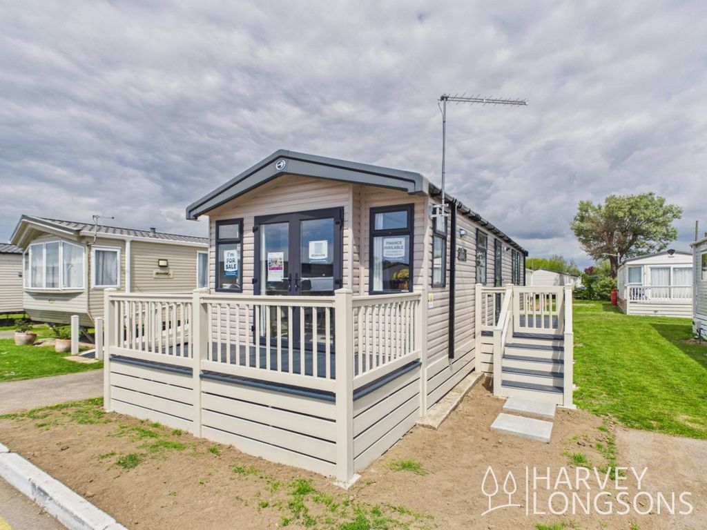 Property photo 1 of 16 Exterior With Decking Of The Swift Burgundy Holiday Caravan At Winchelsea Sands Holiday Park, East Sussex
