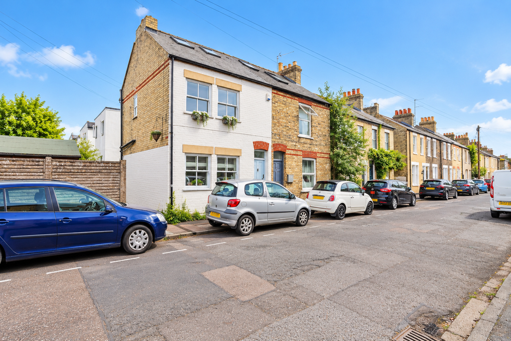 Property photo 2 of 15 Sunny Victorian Terraces And Parked Cars