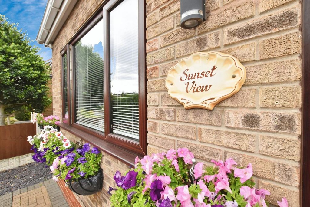 Property photo 3 of 24 Front