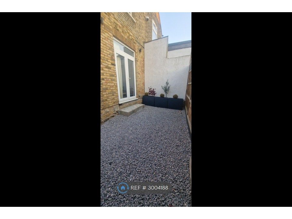 Property photo 2 of 13 Rear Garden