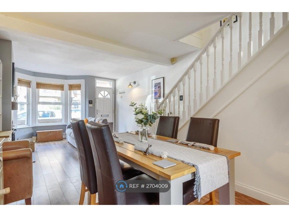 Property photo 3 of 9 Lounge + Dining