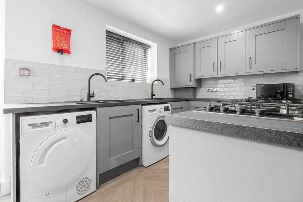 Property photo 3 of 12 Modern And Well-Maintained Kitchen With Ample Work...