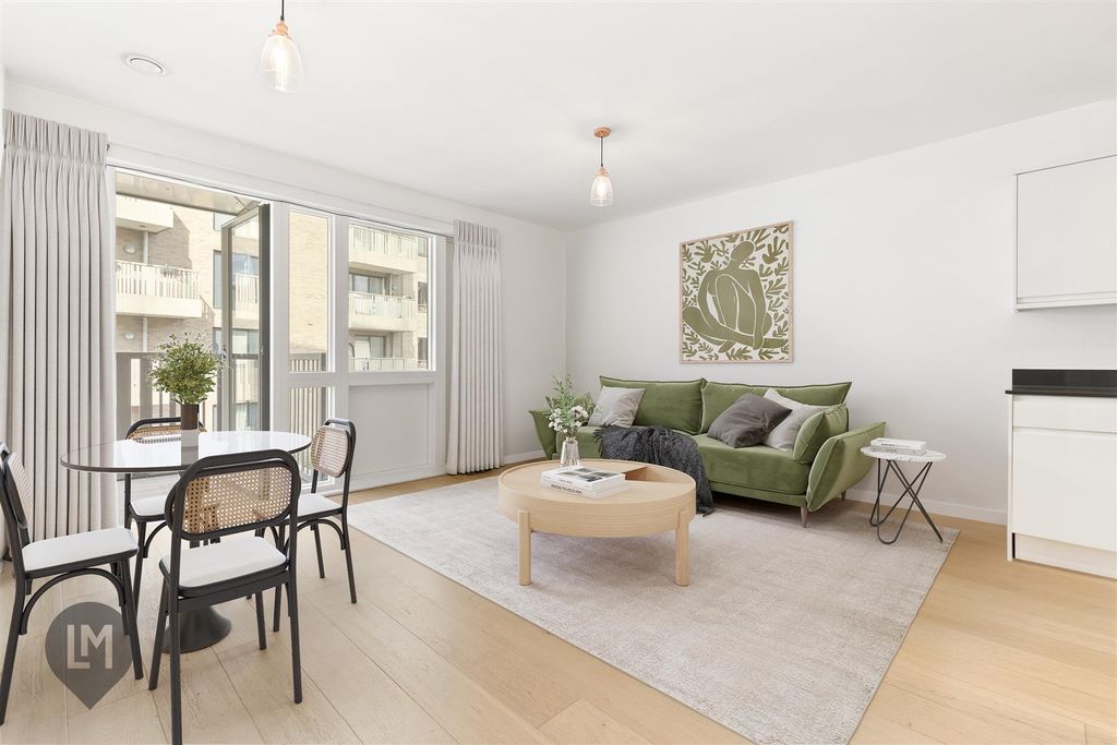 Property photo 1 of 8 Living/Dining Room