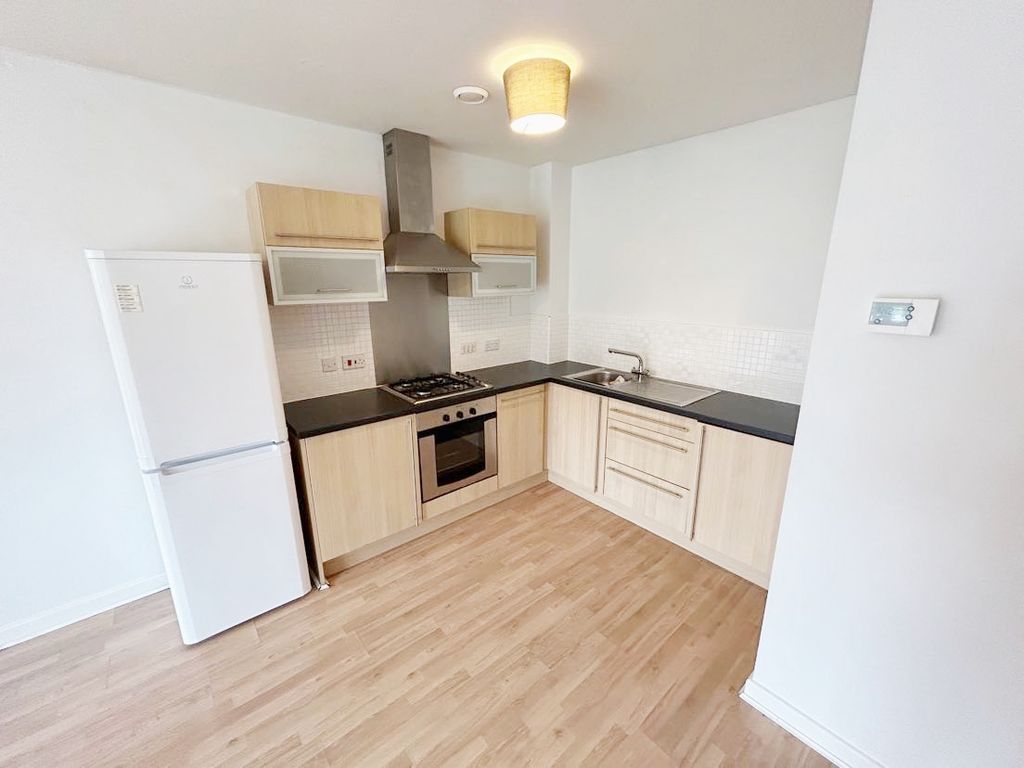 Property photo 3 of 8 Kitchen