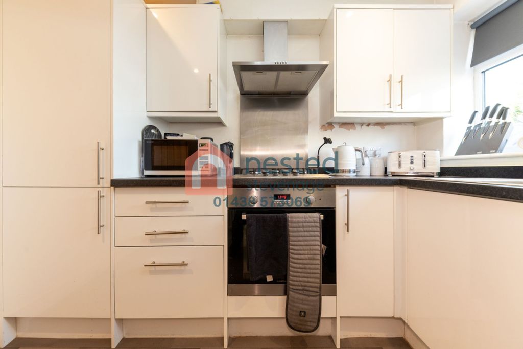 Property photo 3 of 12 Kitchen