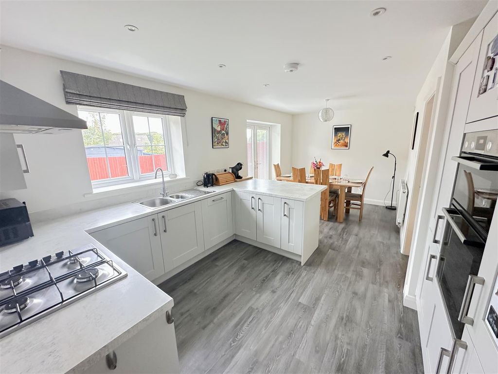 Property photo 2 of 38 Dining Kitchen