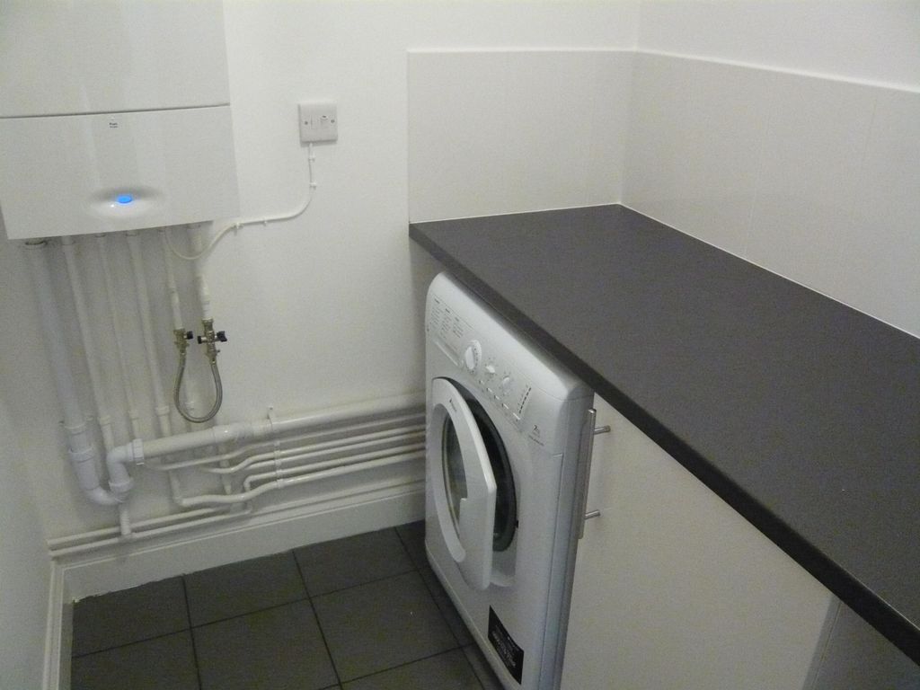 Property photo 3 of 7 Utility Room