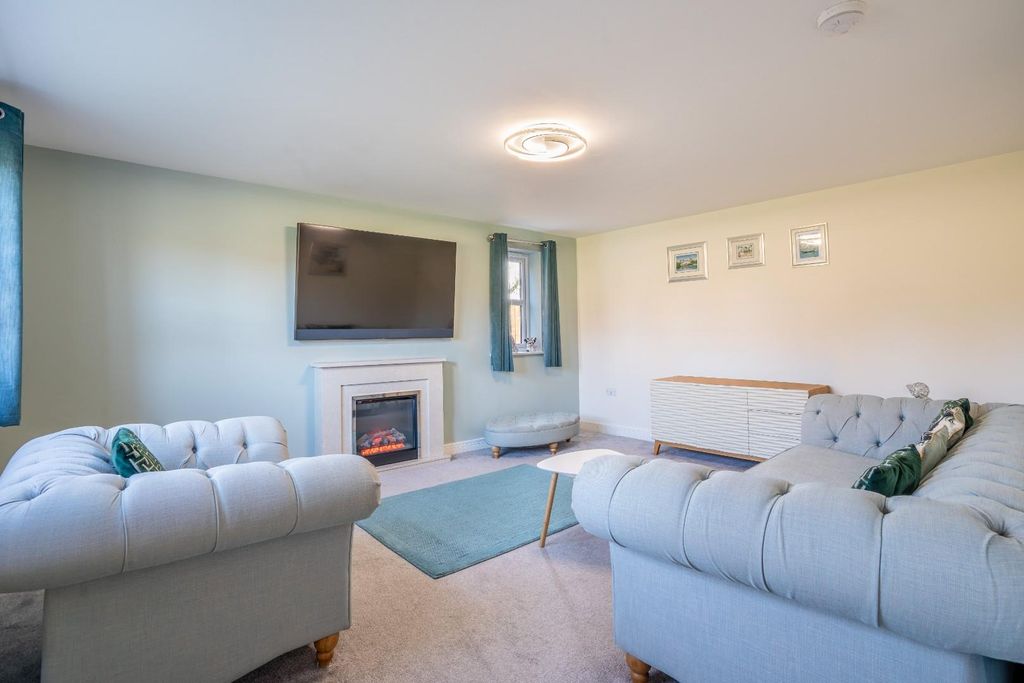 Property photo 2 of 23 Sitting Room