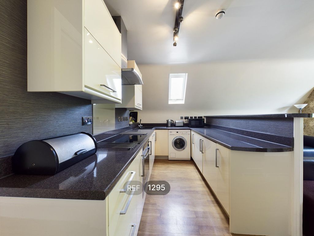 Property photo 1 of 7 Kitchen / Living Area