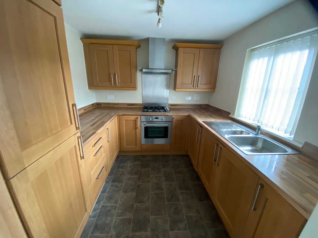 Property photo 3 of 7 Kitchen