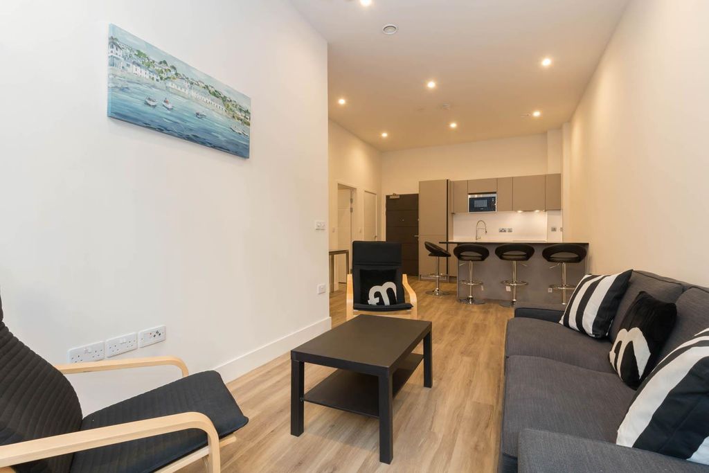 Property photo 2 of 7 Living Area