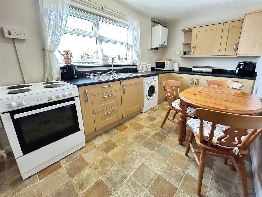Property photo 3 of 15 Dining Kitchen