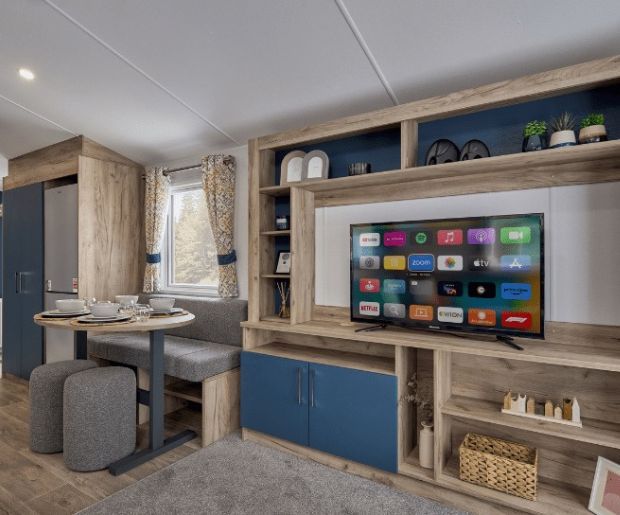 Property photo 2 of 5 Built In Tv Unit And Dining Area Inside The Willerby Ashford Caravan