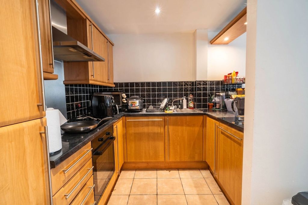 Property photo 2 of 11 Kitchen