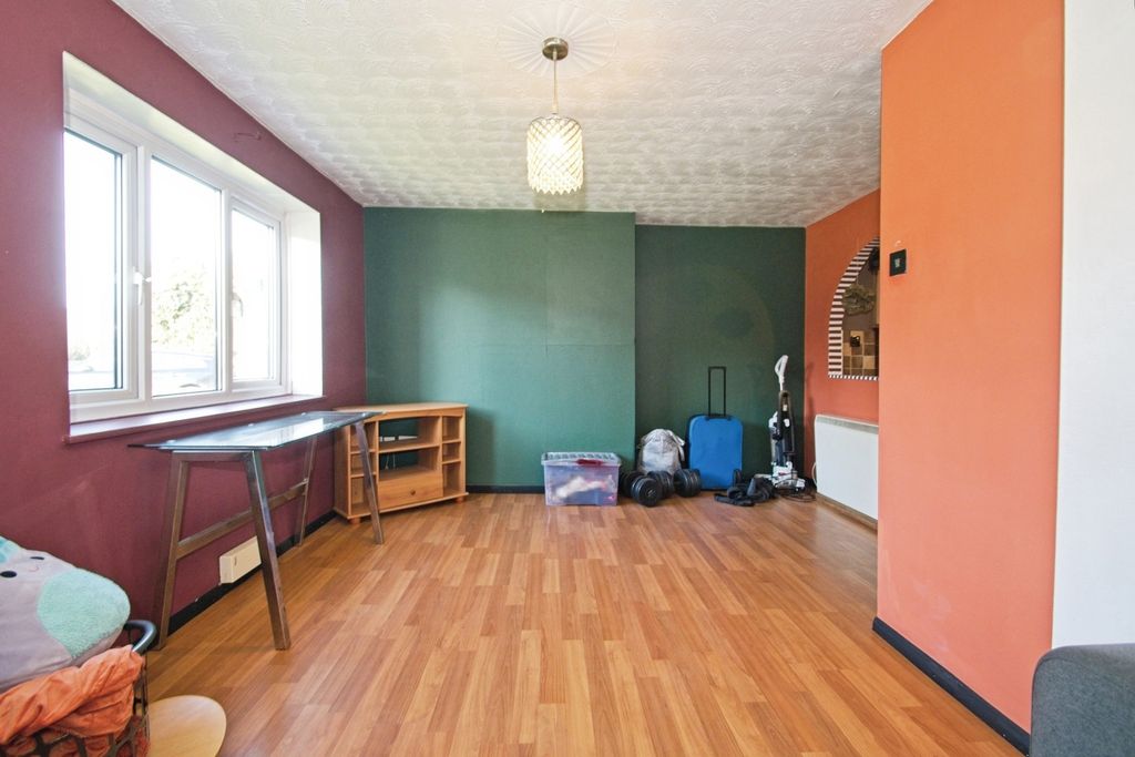 Property photo 2 of 12 Living Area