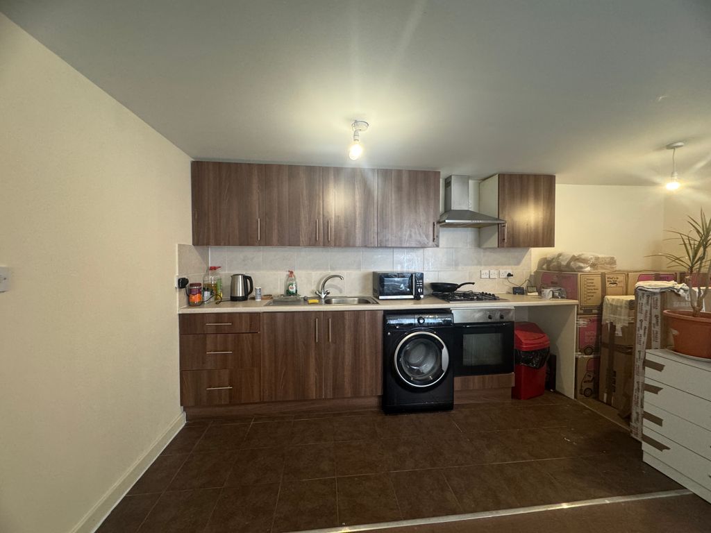 Property photo 2 of 8 Kitchen Area