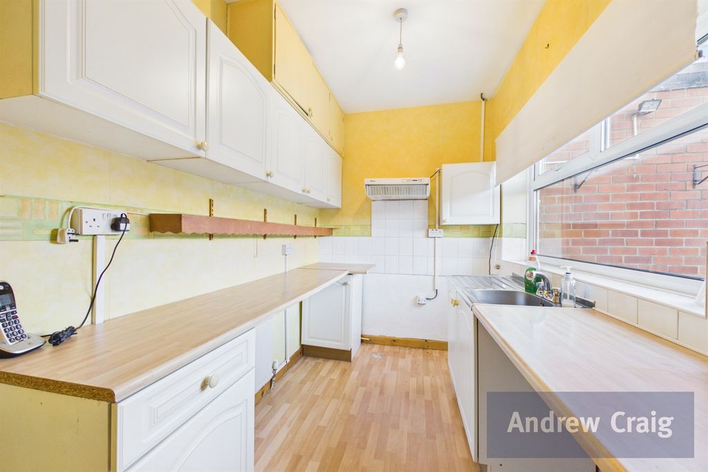 Property photo 3 of 12 Kitchen