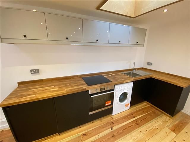 Property photo 3 of 6 Kitchen