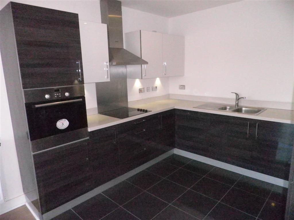 Property photo 3 of 8 Kitchen