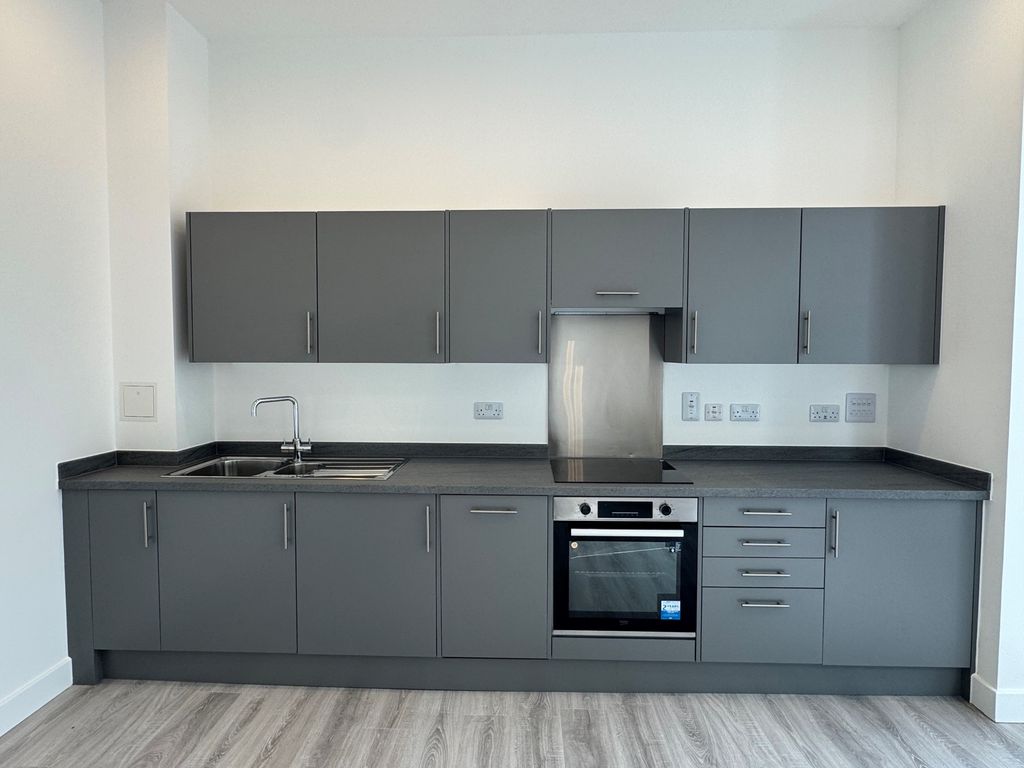 Property photo 3 of 7 Kitchen