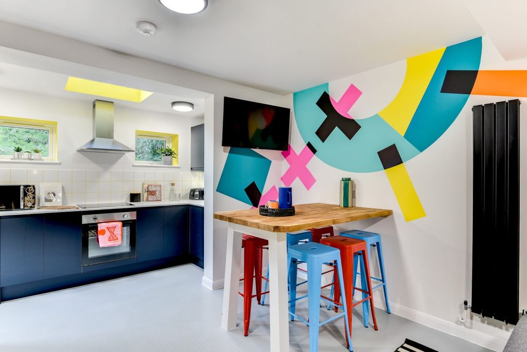 Property photo 2 of 5 Bright Modern Kitchen With Navy Lower Cabinets, St...