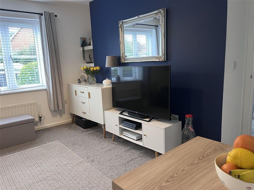 Property photo 2 of 11 TV Area