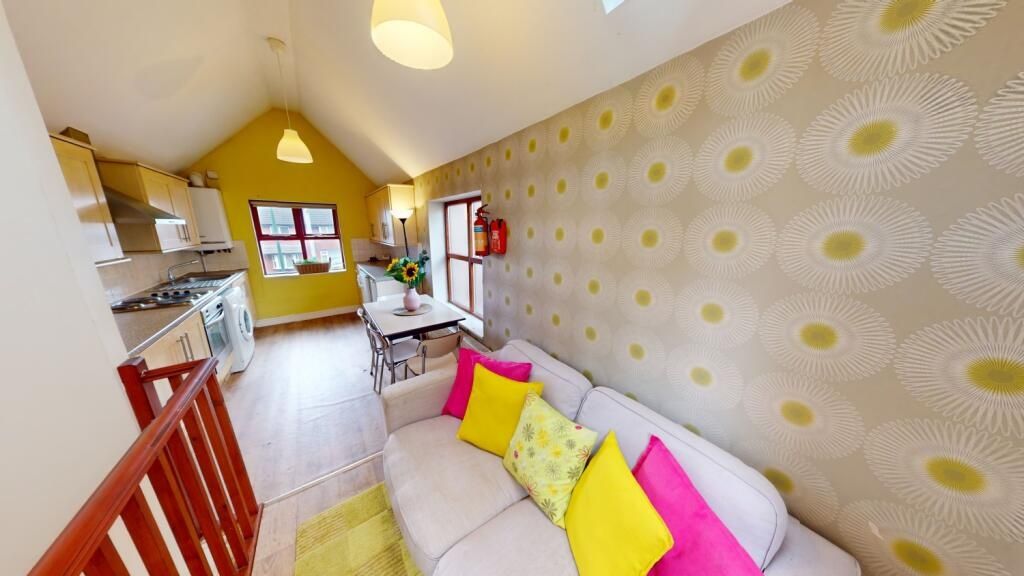 Property photo 3 of 6 Bright And Cozy Living Room With Contemporary Deco...