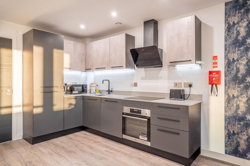 Property photo 3 of 13 Kitchen