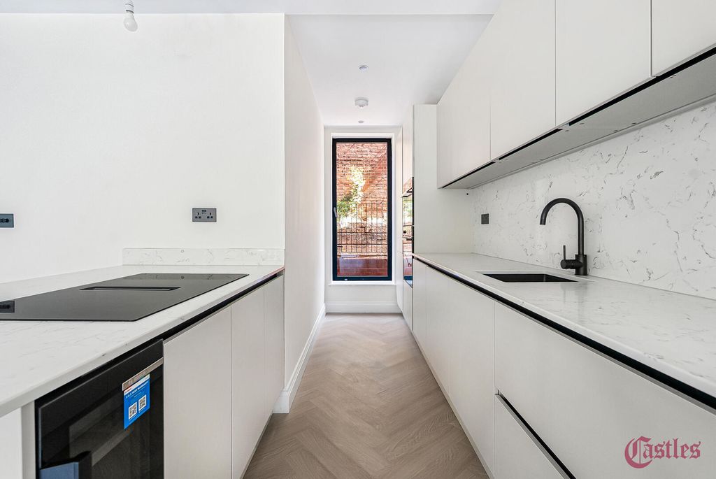 Property photo 3 of 13 Kitchen