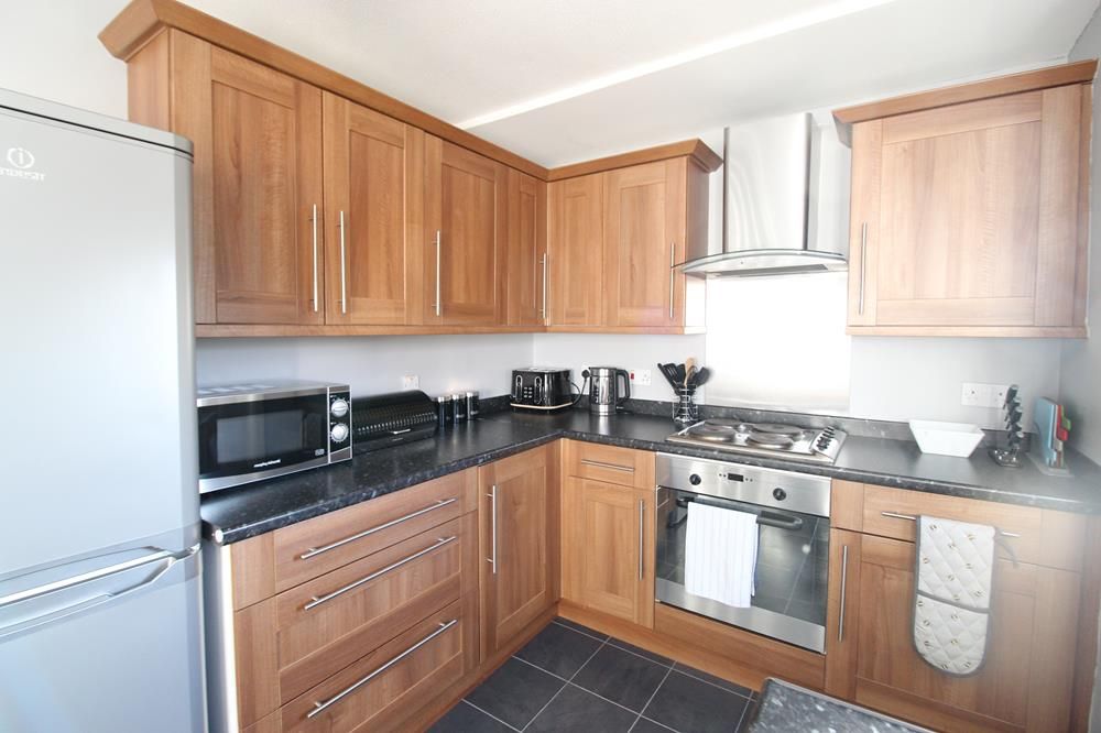 Property photo 3 of 11 Kitchen