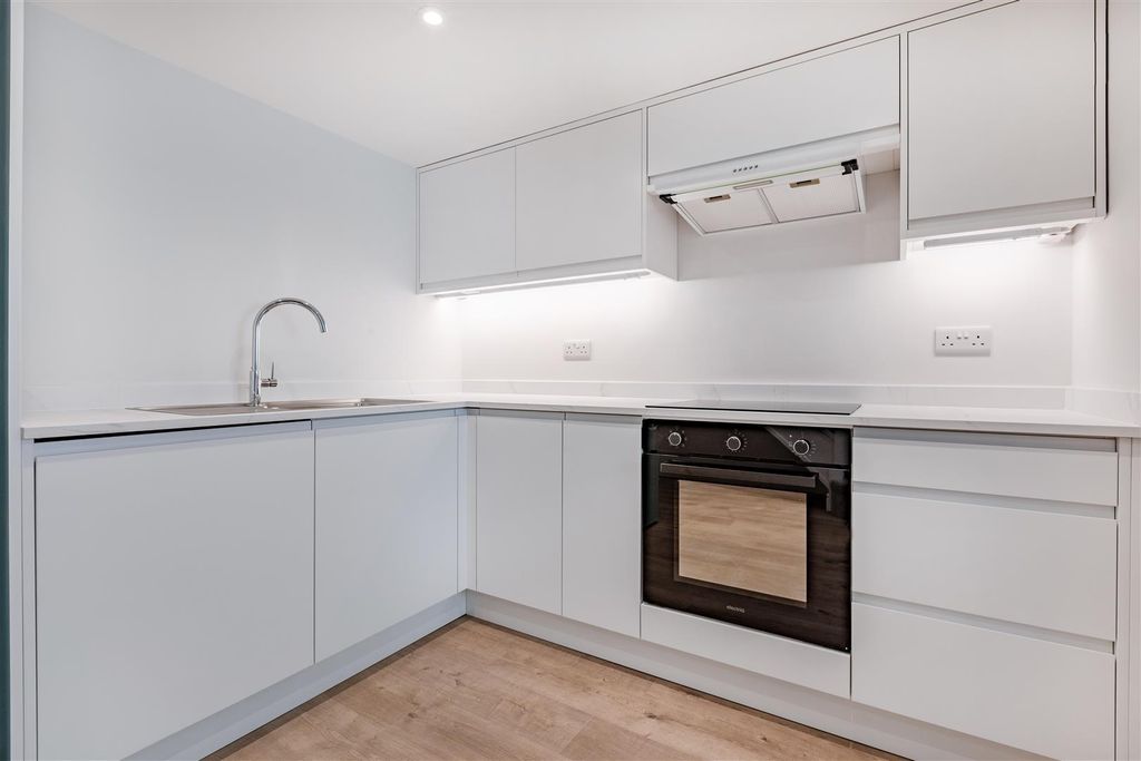 Property photo 3 of 12 Kitchen